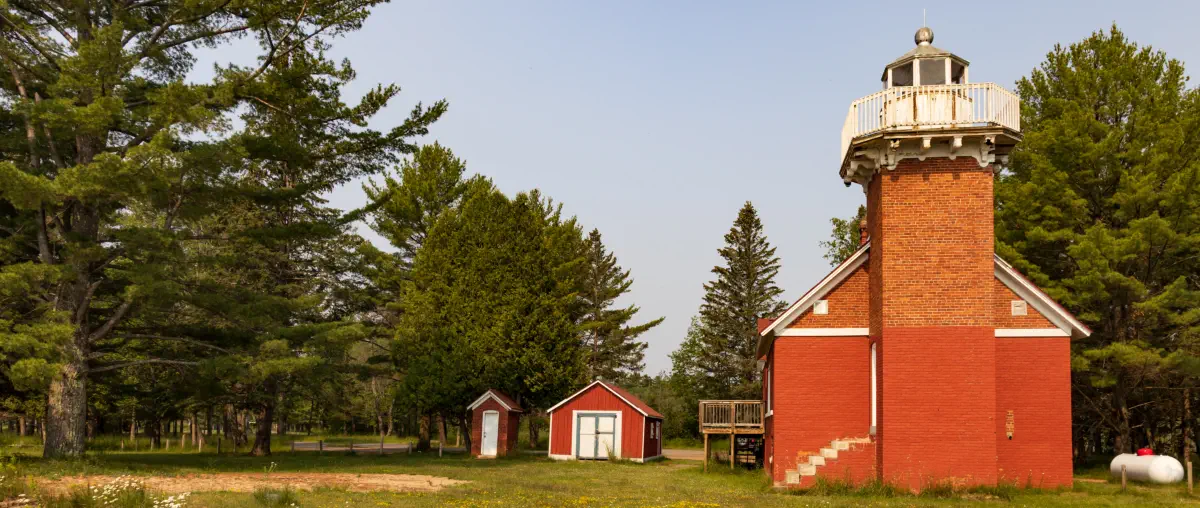 Red brick lighthouse in Baraga Township